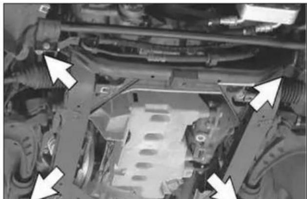 Undercarriage view of a vehicle showing structural components and airflow direction (no text or symbols)