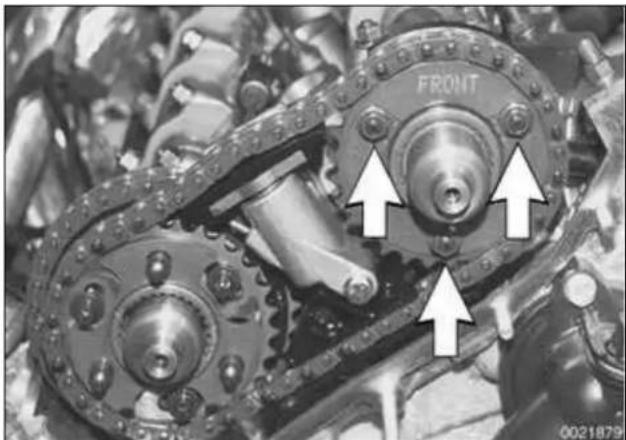 Close-up of mechanical components with arrows pointing to features, no readable text or symbols present