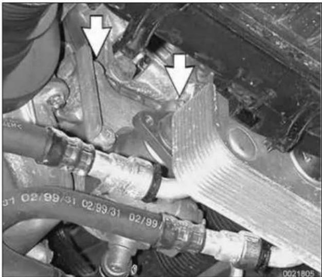 Close-up of mechanical components with no visible text or symbols, showing hoses and connectors (no readable text or symbols)