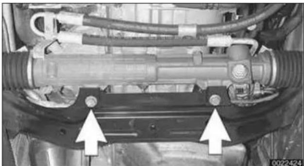 Mechanical assembly diagram showing hoses and brackets with two white arrows pointing to specific components (no text or symbols present)