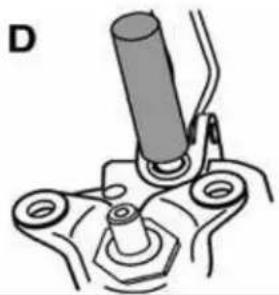 Mechanical assembly diagram showing a cylindrical component inserted into a housing with mounting feet (no text or symbols)