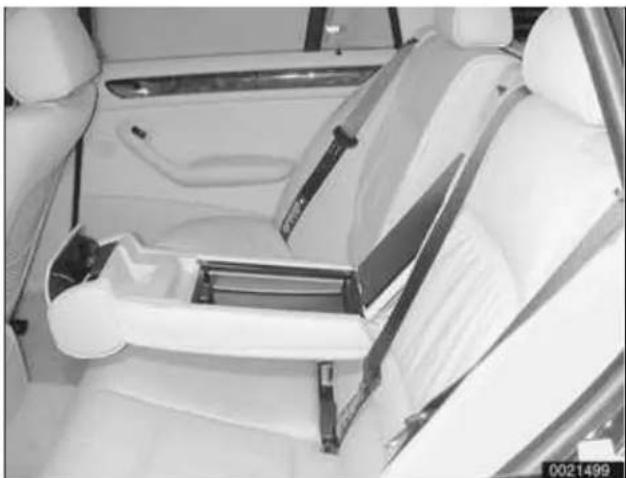 Interior view of a car showing white leather seats and seat brackets (no visible text or symbols)