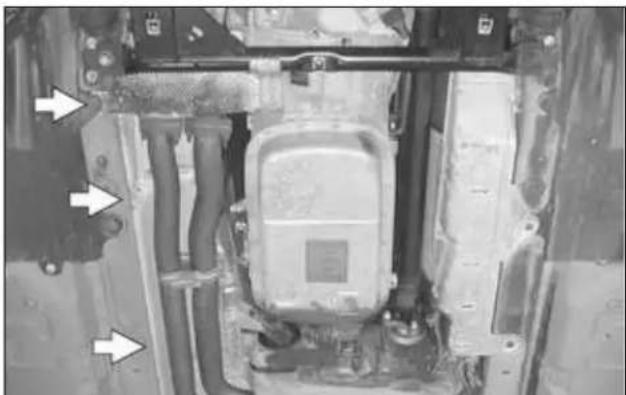Interior view of an automotive chassis frame with visible structural components and mounting brackets (no text or symbols)