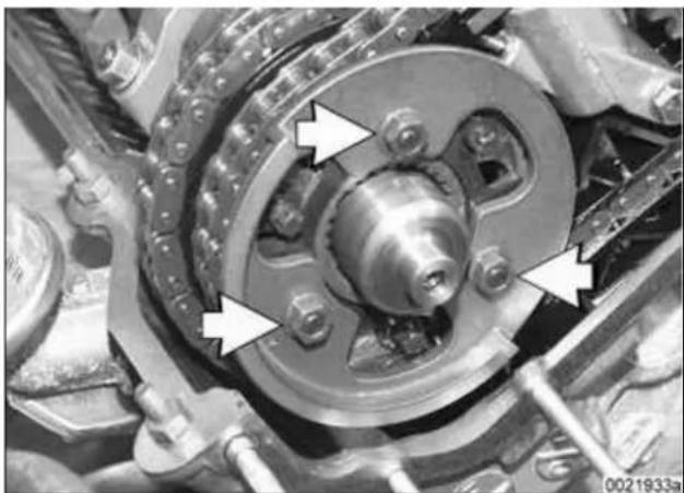 Close-up of a mechanical coupling or bearing assembly with arrows pointing to specific components (no visible text or symbols)