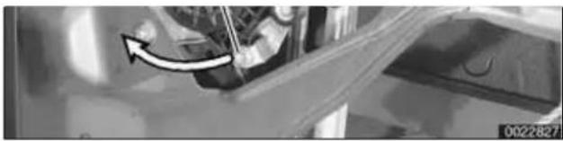 Close-up of a mechanical component with an arrow indicating motion (no visible text or symbols)