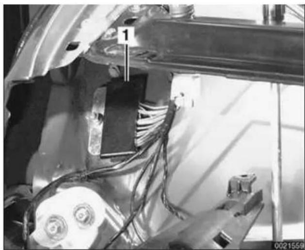 Close-up of a mechanical assembly with visible wiring and components (no text or symbols)