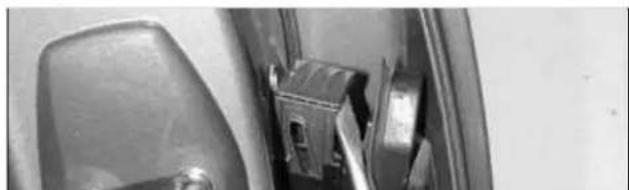 Close-up of a metallic door handle and keyhole (no visible text or symbols)