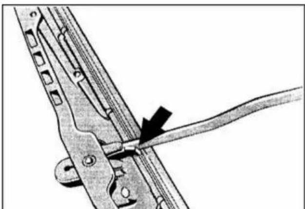 Mechanical assembly diagram showing a tool interacting with a bracket (no text or symbols visible)