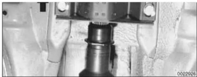 Close-up of a mechanical assembly with a cylindrical component inserted into a housing (no visible text or symbols)