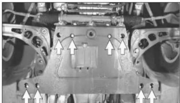 Close-up of a vehicle chassis frame with mounting holes and structural components (no visible text or symbols)