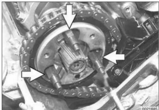 Close-up of a mechanical assembly with arrows pointing to specific components (no visible text or symbols)