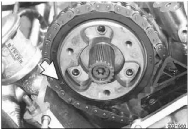 Close-up of a mechanical gear assembly with a highlighted shaft and mounting holes (no visible text or symbols)