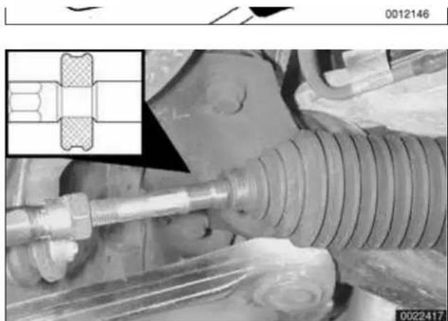 Mechanical assembly diagram showing a bolted joint with threaded shaft and housing, plus an inset close-up of a bolted component (no text or symbols visible)