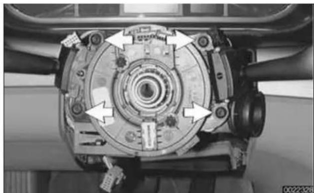 Close-up of a mechanical assembly with directional arrows indicating components (no visible text or symbols)