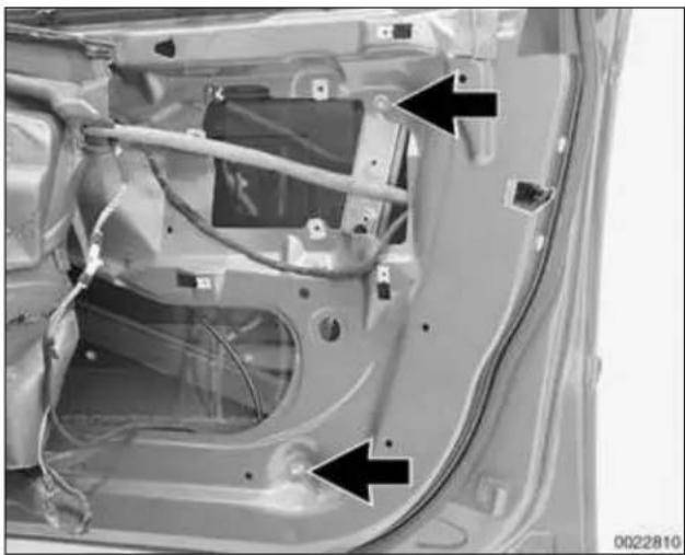 Interior view of a car's front panel showing structural components and wiring (no text or symbols visible)