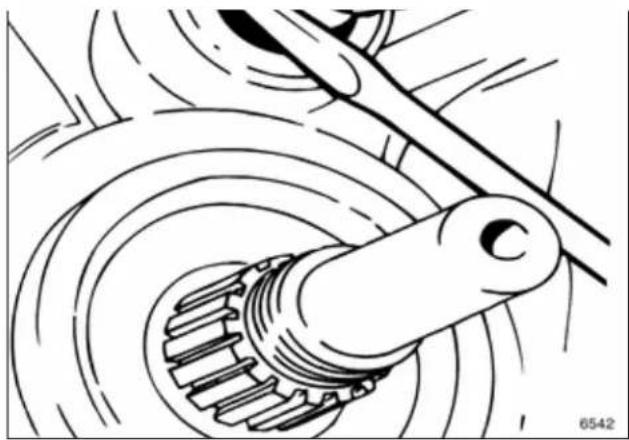 Mechanical gear assembly diagram showing meshing gears and shaft (no text or symbols)