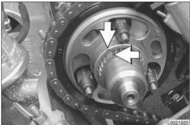 Close-up of a mechanical assembly with rotating components and mounting holes (no visible text or symbols)