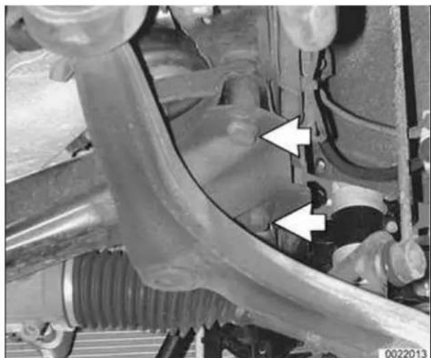 Close-up of a mechanical assembly with visible brackets and bolts, no text or symbols present