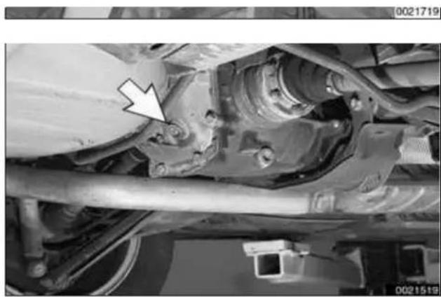 Close-up of a vehicle chassis showing suspension components and structural beams (no visible text or symbols)