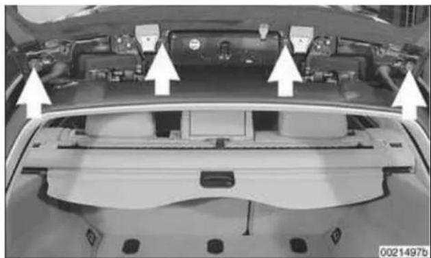 Top-down view of a car's front bumper with visible engine compartment and structural components (no text or symbols)