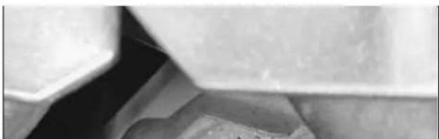 Close-up of a mechanical component with no visible text or symbols