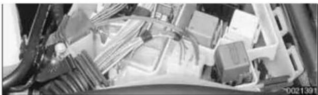 Interior view of a car showing internal components like fuel tanks and battery packs (no visible text or symbols)