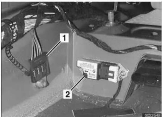 Technical diagram showing labeled components of an electrical or mechanical device with numbered parts 1 and 2.
