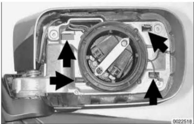 Cross-sectional view of a mechanical device showing internal components and directional arrows (no text or symbols)