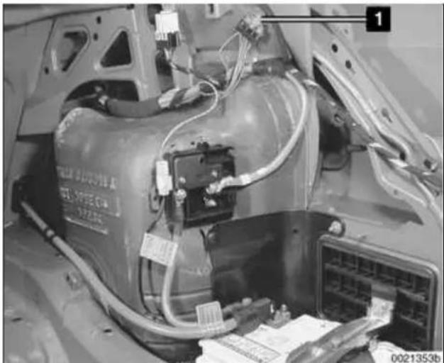 Close-up of a vehicle's internal components with visible wiring and battery pack (no readable text or symbols)