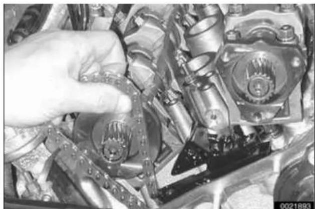 Close-up of a hand adjusting mechanical components, no visible text or symbols