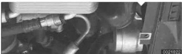 Close-up of internal mechanical components with hoses and tubing (no visible text or symbols)
