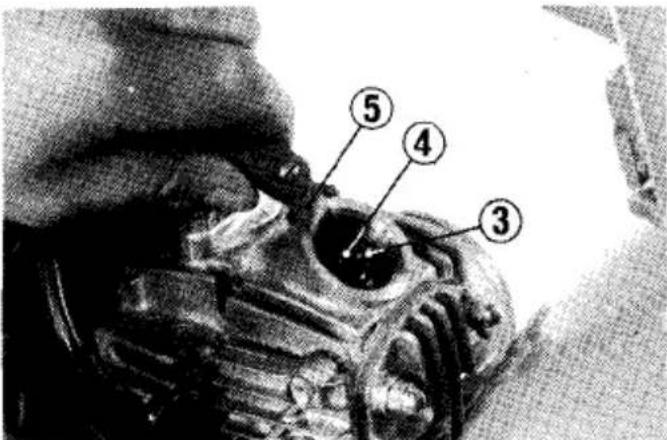 Close-up of a mechanical component with numbered parts labeled 3, 4, and 5