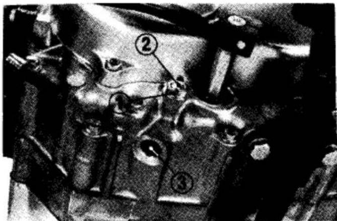 Technical diagram of a mechanical component with numbered parts and labeled features