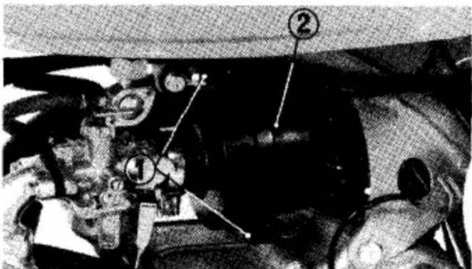 Technical diagram of a mechanical assembly with numbered components, likely an engine or motor assembly.