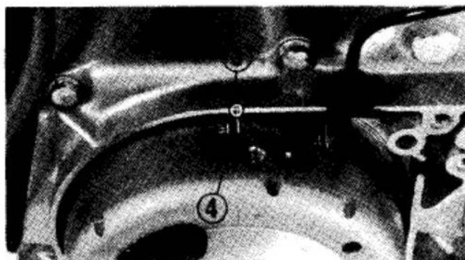 Technical diagram of a mechanical component with numbered parts and alignment markers