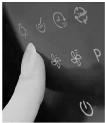 Hand holding a computer screen displaying icons for weather, climate, energy, and others in Chinese.