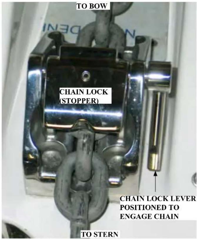 TO BOW CHAIN LOCK (STOPPER) CHAIN LOCK LEVER POSITIONED TO ENGAGE CHAIN TO STERN