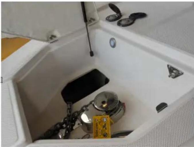 Interior view of a white submarine bay with visible hull, side lock, and accessories (no text or symbols)