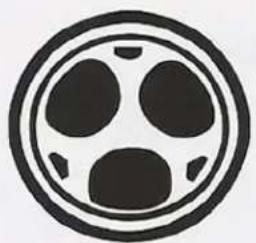 Circular emblem with three petal-like shapes inside, no text or symbols present.