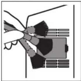 Diagram of a hand holding a device with a panel, no visible text or symbols