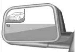 Side mirror reflecting a car image, no text or symbols visible