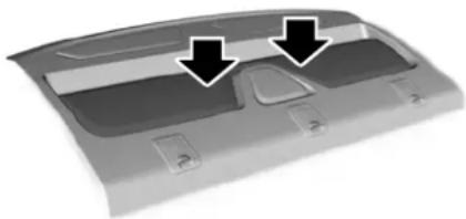 Top-down view of a car door panel with two black arrows pointing to the side panels (no text or symbols visible)