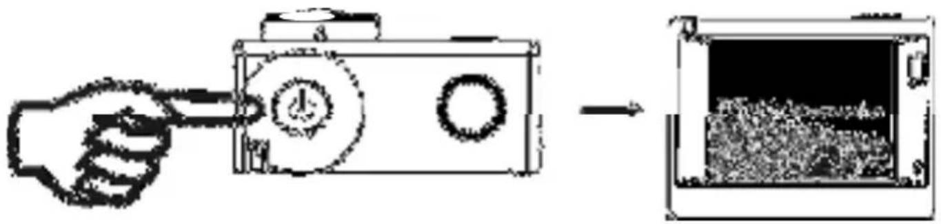 Diagram showing a hand inserting a camera into a device, with an arrow indicating the process.