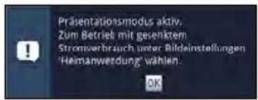 Präsentationsmodus aktiv. Zum Betrieb mit gesenktem Stromverbrauch unter Bildeinstellungen 'Heimanweedung' wählen. OK