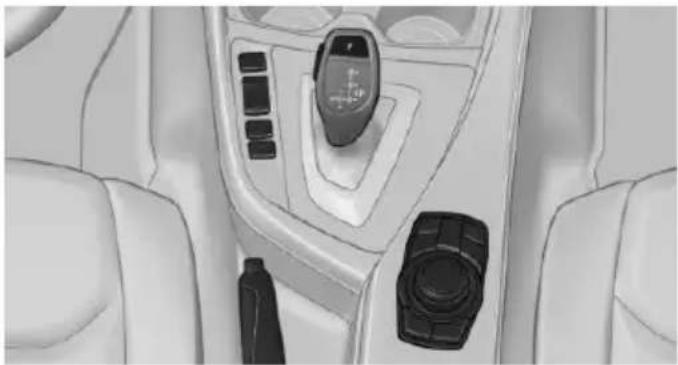 Interior view of a car dashboard with steering wheel, dashboard lock, and seatbelt (no text or symbols visible)