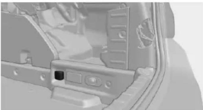 Interior view of a vehicle's front panel showing structural components and a control panel (no text or symbols visible)