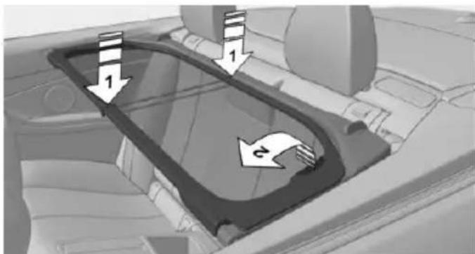 Interior view of a car dashboard with directional arrows indicating traffic flow (no text or symbols)