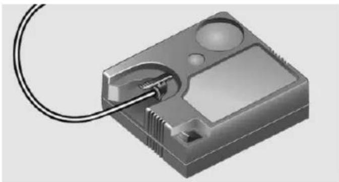 3D rendering of a mechanical component with a coiled cable and internal components (no text or symbols visible)