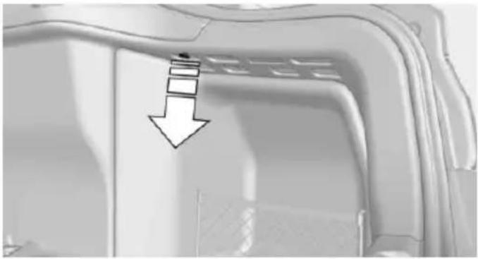 Close-up of a mechanical component with a downward arrow indicating a feature or process (no text or symbols visible)