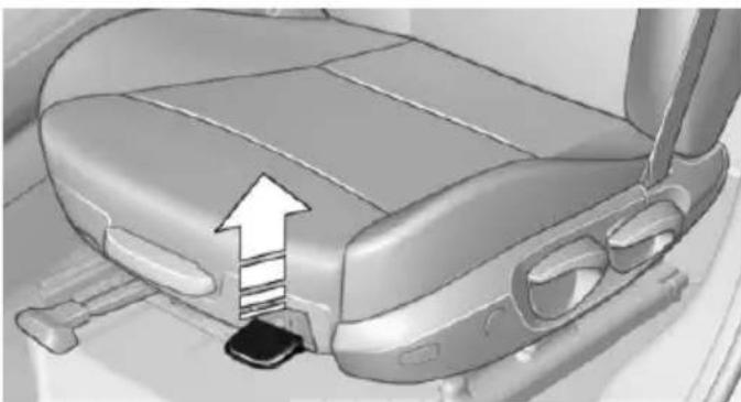 3D rendering of a car seat with a highlighted seatbelt and upward arrow indicating motion (no text or symbols)